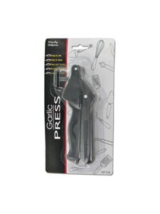 Garlic press with cleaner