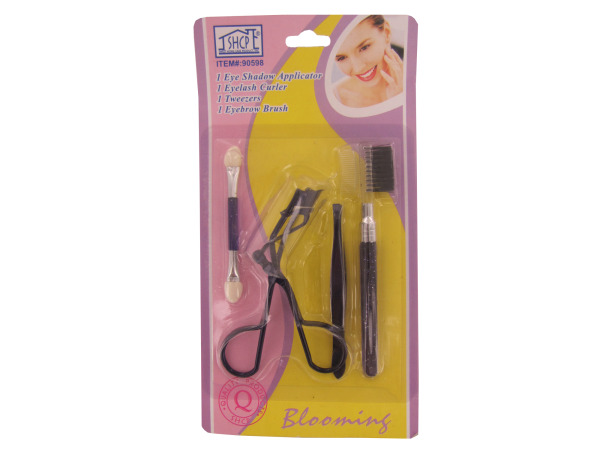 4 piece eyeshadow applicator, curler, tweezer, eyebrow brush